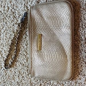Anne Klein gold snake embossed fabric wristlet